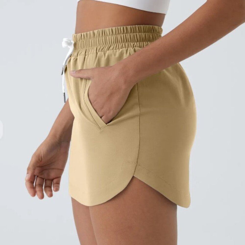 High Waisted Drawstring Side Pocket 2-in-1 Curved Hem Mini Golf Skirt